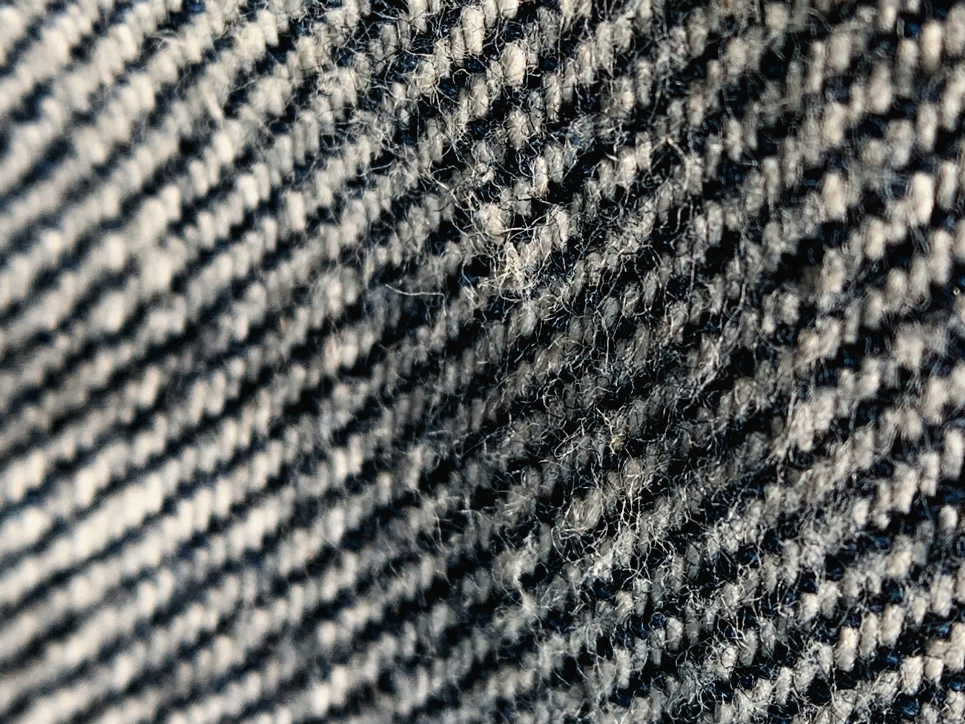 a close up of a black and white checkered fabric